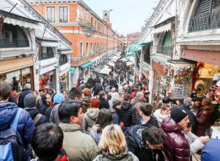 Rialto Bridge, Venice. Crowds shopping on the Rialto Bridge, Venice, Italy.